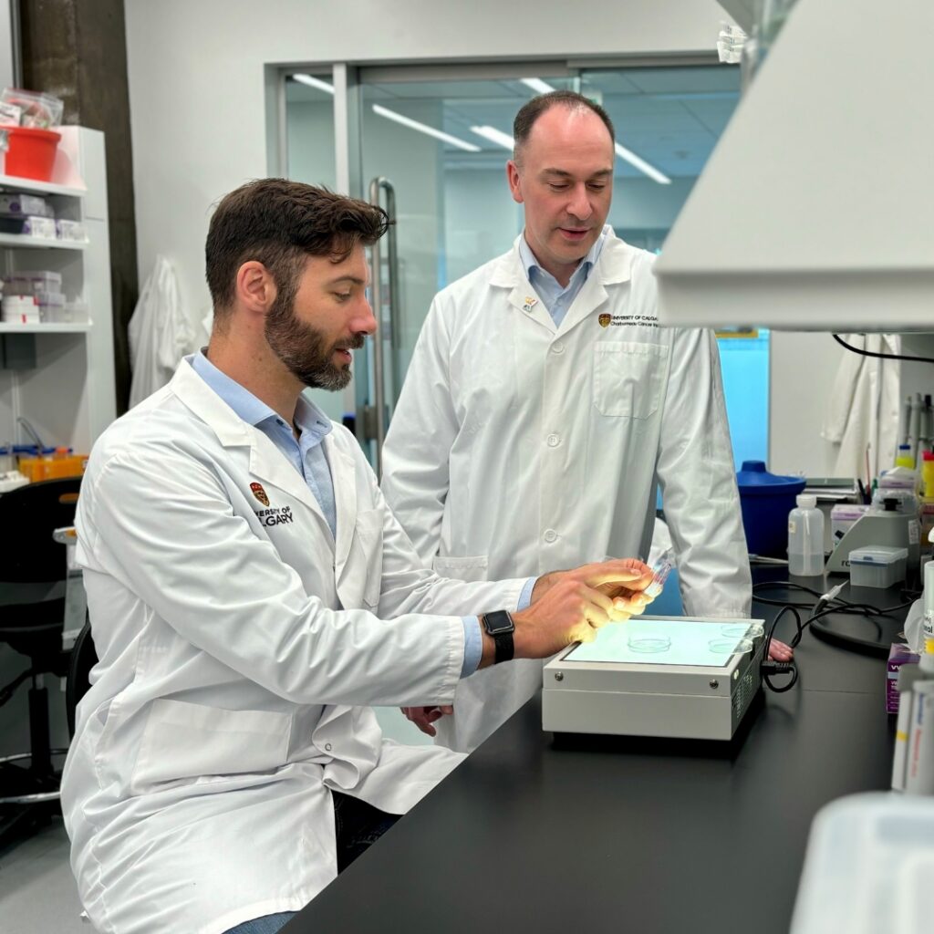 Dr. Dustin Pearson (Left) and Dr. Aaron Goodarzi (Right) in the Transdisciplinary Cancer Research Hub (Photo Credit: Allie Miller, Arnie Charbonneau Cancer Institute)